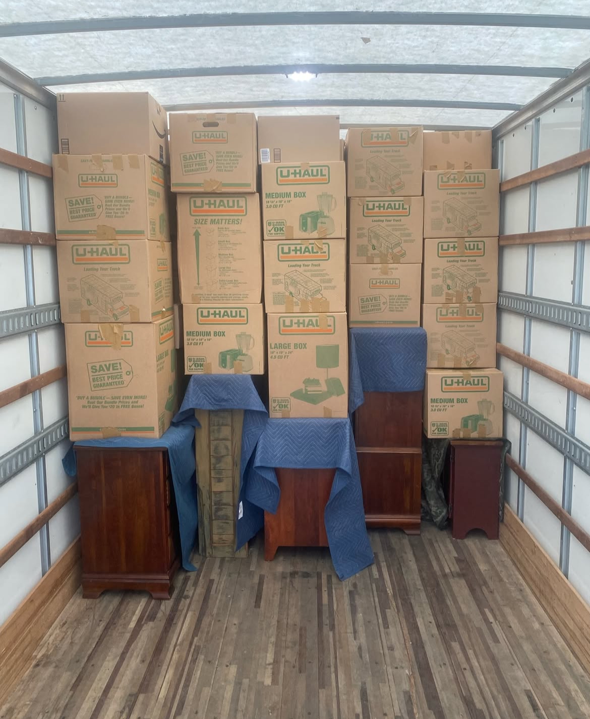 Movers on truck ramp